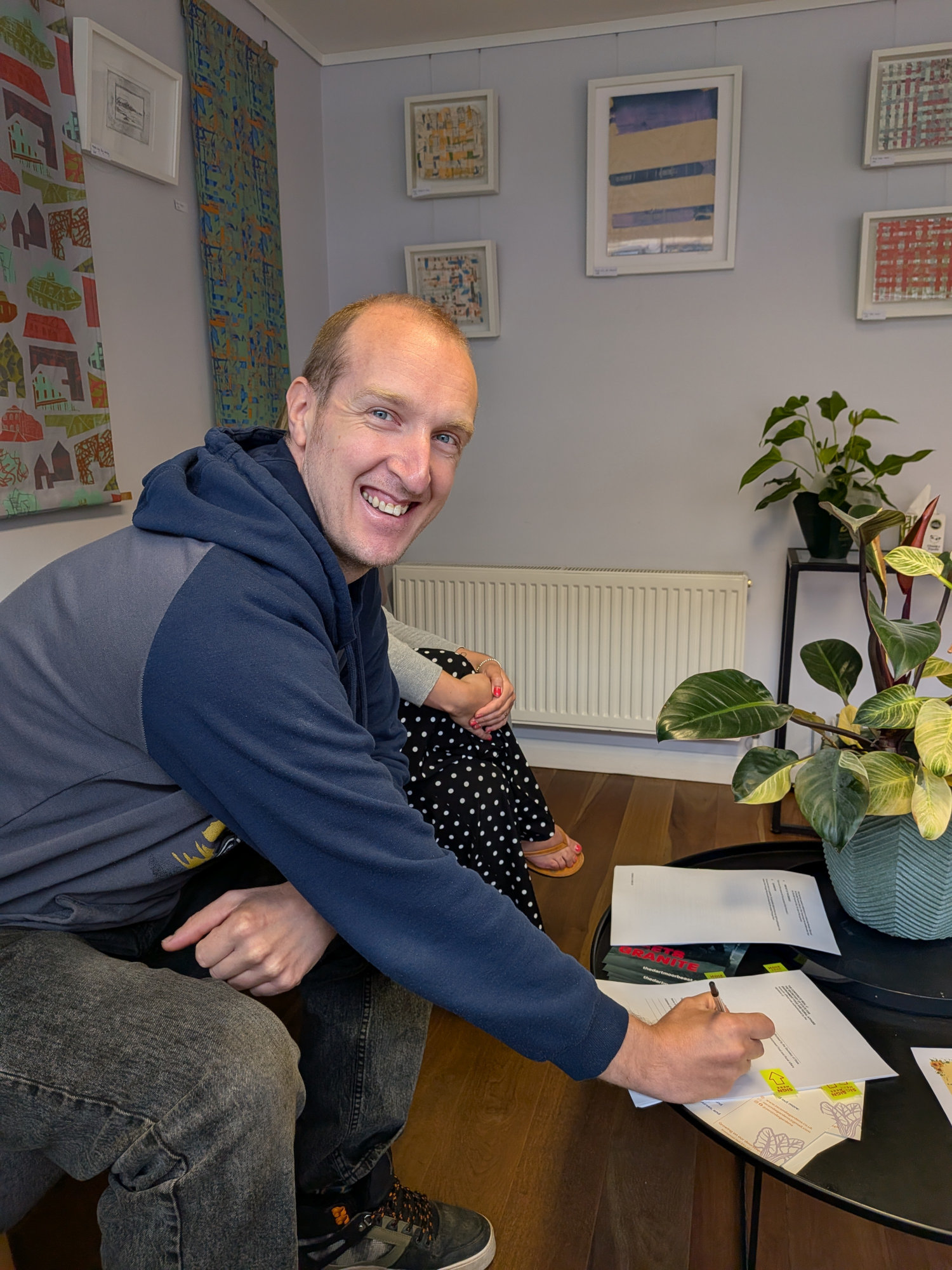 Picture of Andy signing the Cafeside lease with Forestry England